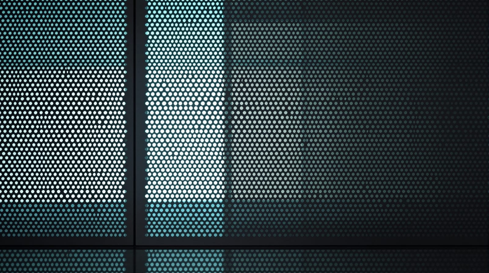 Light passing through the perforated grid of a server rack door